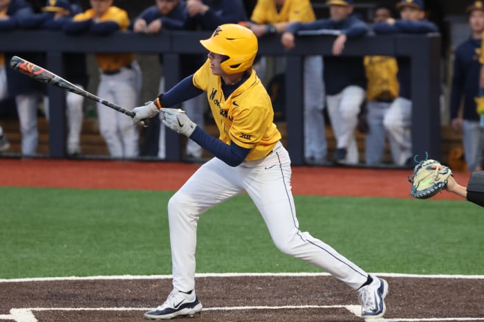 West Virginia freshman Michael Perazza singles in the third inning.